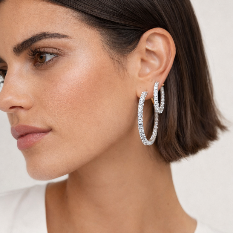  Inside-Out vs Traditional Hoop Diamond Setting Comparison - Close-up cross-sectional view showing diamond placement differences, light reflection patterns, and structural engineering that maximizes sparkle visibility from all angles