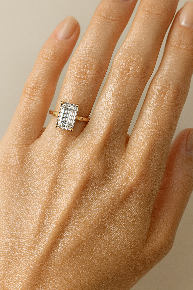 Emerald Cut Length-to-Width Ratio Visual Guide - Side-by-side comparison showing how 1.40:1, 1.50:1, and 1.60:1 ratios appear on different hand types, solving the selection confusion buyers face