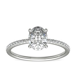 Pave ring with oval cut lab-grown diamond