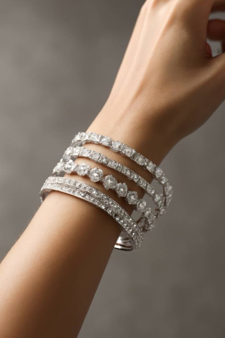 Image: Elegant Diamond Bangle Stack on Wrist - Red Carpet Glamour Made Accessible
